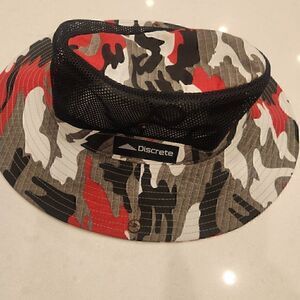Discrete vented cammo bucket hat.